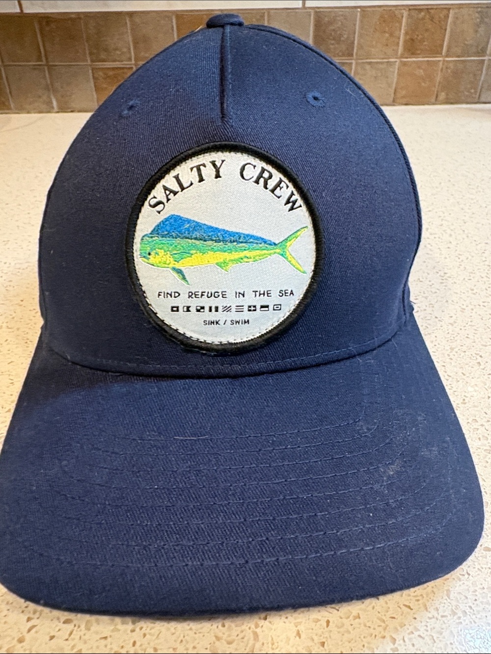 Salty Crew Navy Blue Patch Cap with Green-Yellow Fish